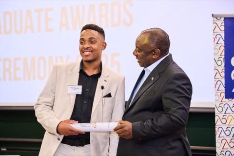 Certificate moment at the Cyril Ramaphosa Foundation
